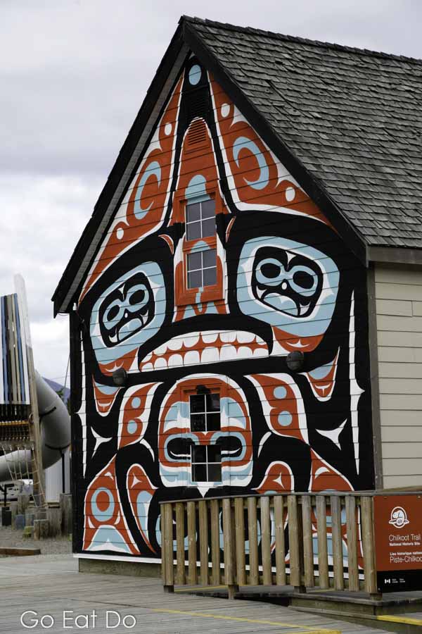 First Nations artwork on the facade of a building in Carcross, the Yukon