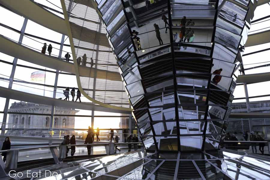 Sunset seen through the glass cupola of the Reichstag Building in Berlin, Germany. The Berlin in Ontario was renamed Kitchener in 1916