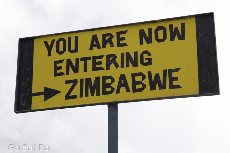 'You are now entering Zimbabwe' says a sign marking the Zambia-Zimbawe border on the Victoria Falls Bridge