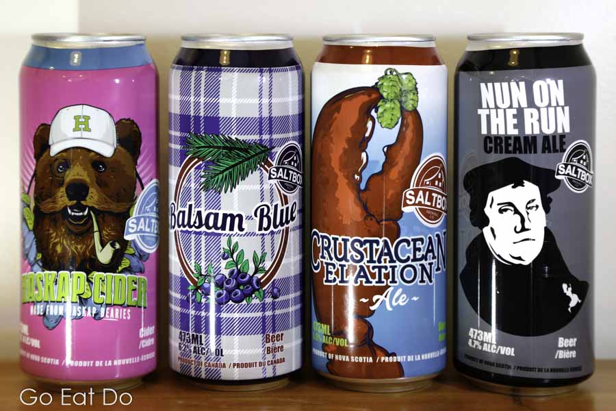 Cans of Haskap Cider, Balsam Blue, Crustacean Elation ale and Nun on the Run pale ale, products of the Saltbox Brewing Company