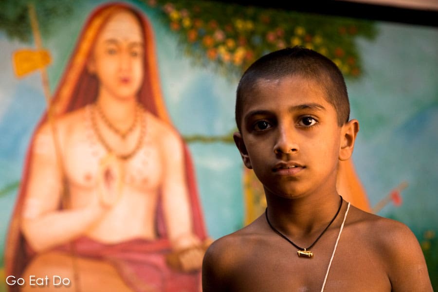 Namboothiri Brahmin student wears the symbolic sacred thread in the grounds of the Vadakke Madham Brahmaswam (Brahmaswam Madham) at Thrissur (Trichur), in Kerala, India
