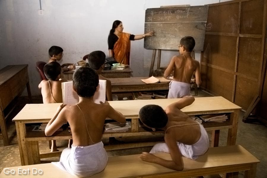 Students during a Hindi lesson at the Vadakke Madham Brahmaswam (Brahmaswam Madham) in Thrissur (Trichur), Kerala, India