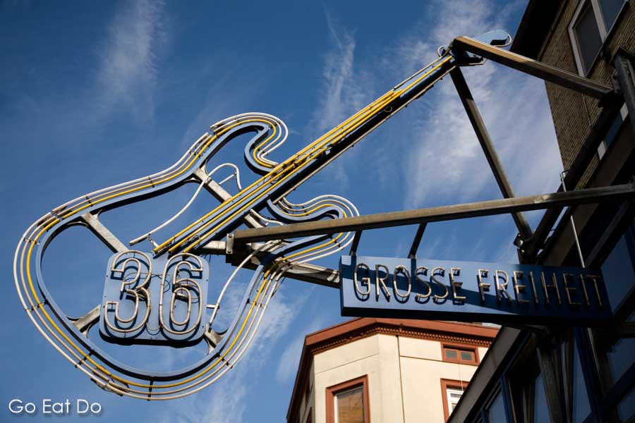 Neon light and guitar-shaped sign for Grosse Freiheit 36, a nightclub and live entertainment venue on the Grosse Freiheit in the St Pauli district of Hamburg