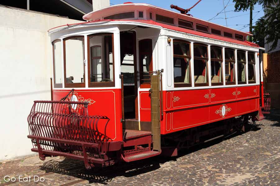 A historic tram displayed at the Museu da Carris transport museum in the Alcantara district of Lisbon, Portugal