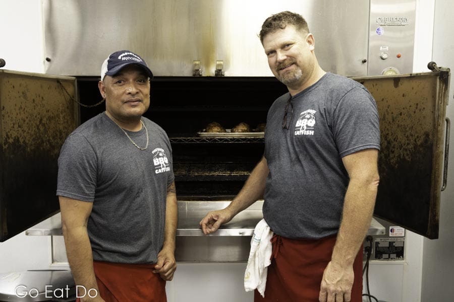 Chef Mitchell shows off the oven at Piggyback's Barbeque and Catfish restaurant at Lake City in South Carolina, USA