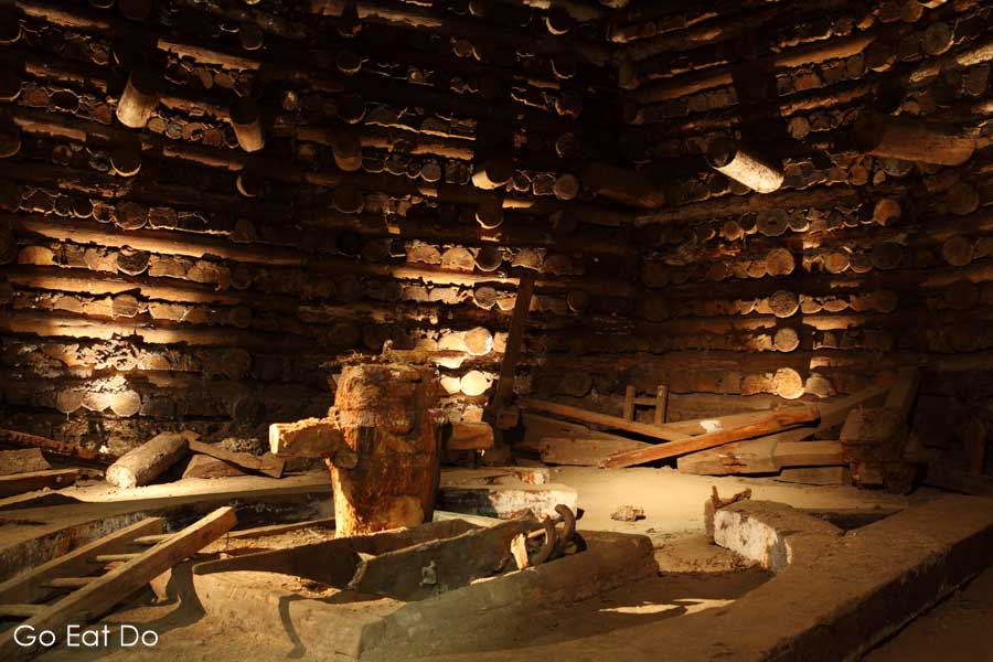 Chamber where horses used to turn, with logs preserved by salt, at Wieliczka Salt Mine near Kraków, Poland