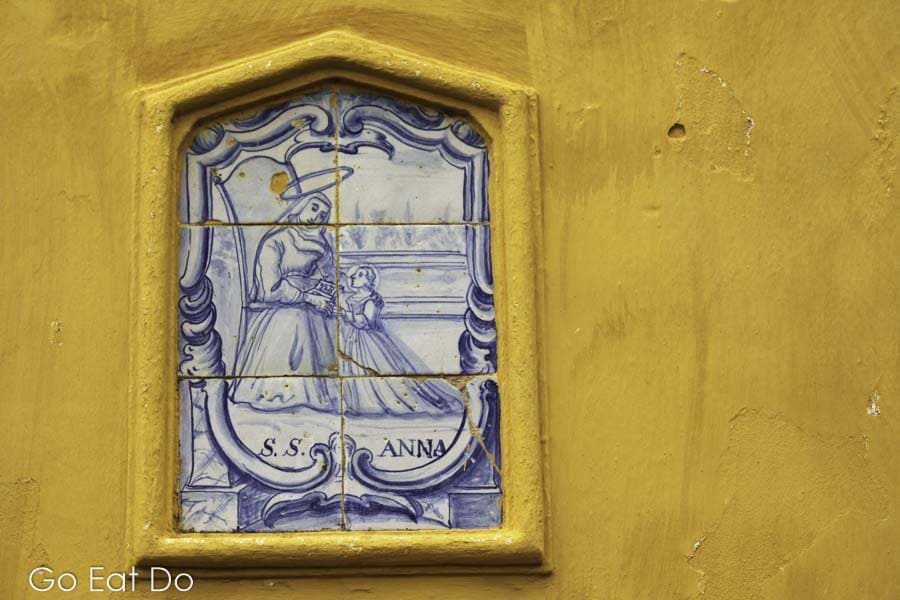 Azulejo tiles represent the figure of Saint Anna on the chapel at the Quinta de Sant'Ana in the village of Gradil, near to Mafra, in Portugal