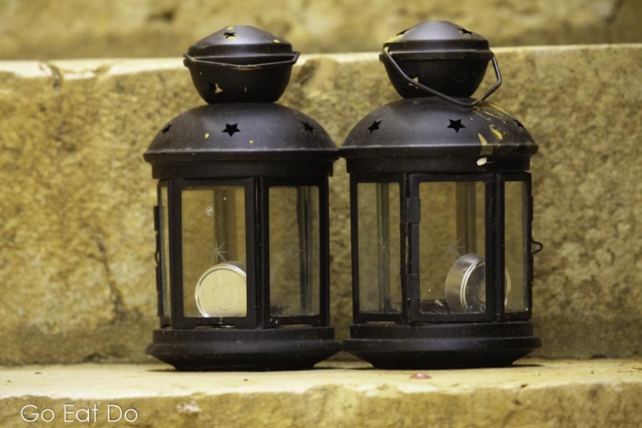 Lamps stand on the stairs of a building at the Quinta de Sant'Ana