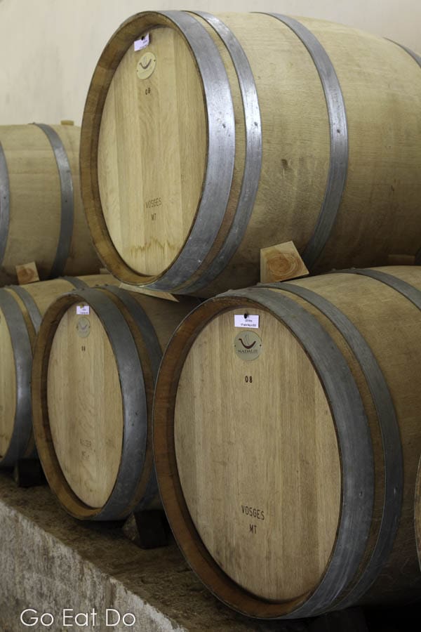 Oak barrique-style barrels used to age wine at the Quinta de Sant'Ana wine estate
