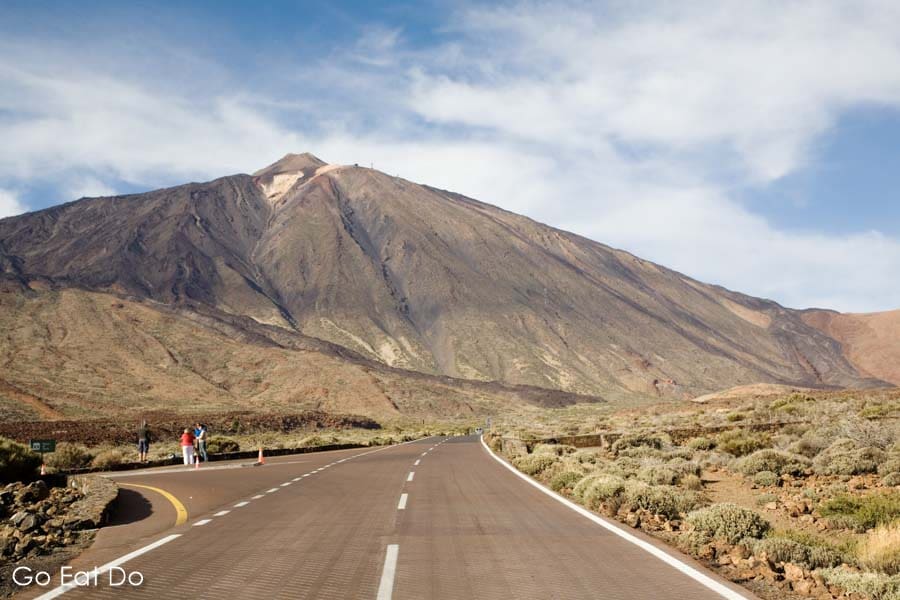 Road running towards Mount Teide, Spain's highest mountain, in Teide National Park (Parque Nacional de las Canadas del Teide) on Tenerife