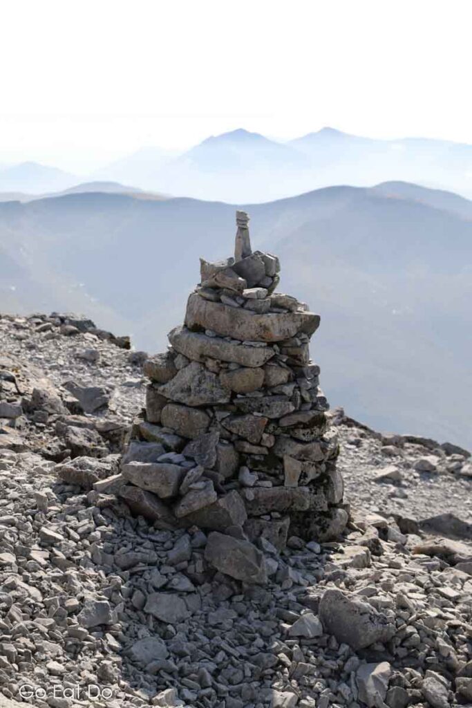 Cairn at the summit of Ben Nevis, the highest of all of the Munros in Scotland.