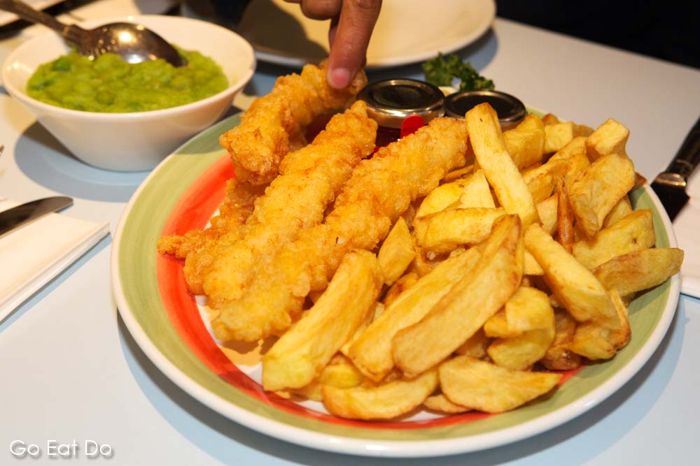 Fish and chips and Poppies restaurant during Easting Europe's Food Tour of London's East End