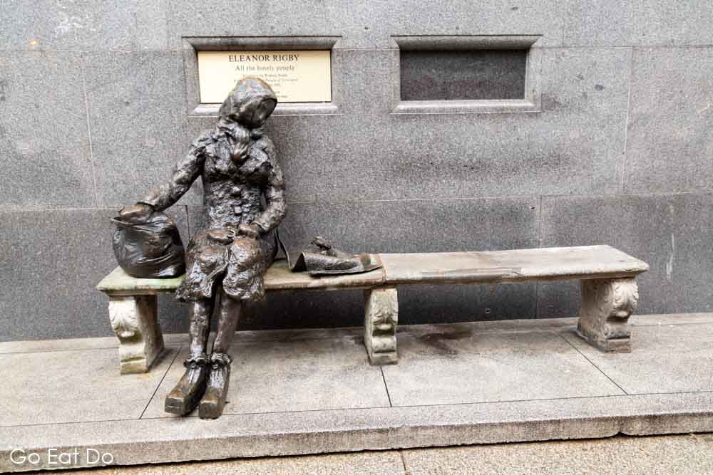 Statue depicting Eleanor Rigby, sculpted by Tommy Steele, on Stanley Street in Liverpool, England