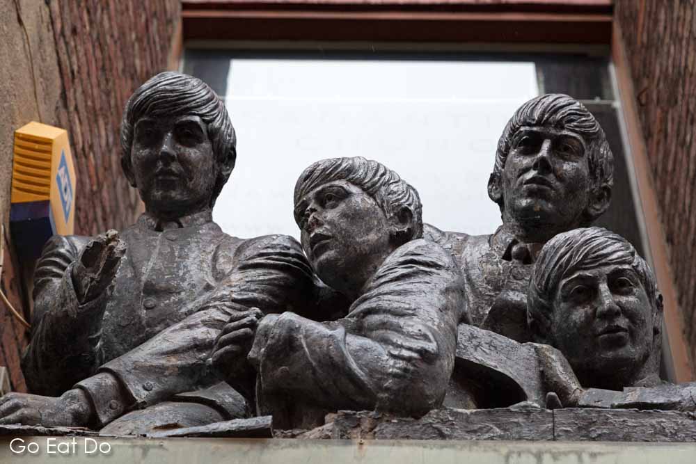 Statue of the Fab Four above The Beatles Shop on Matthew Street in Liverpool, England