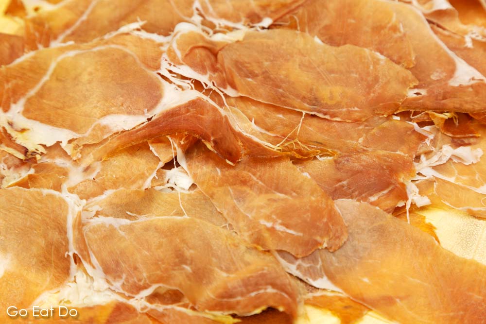 Slices of Parma ham (Prosciutto di Parma) ahead of being chopped for use in my carbonara sauce