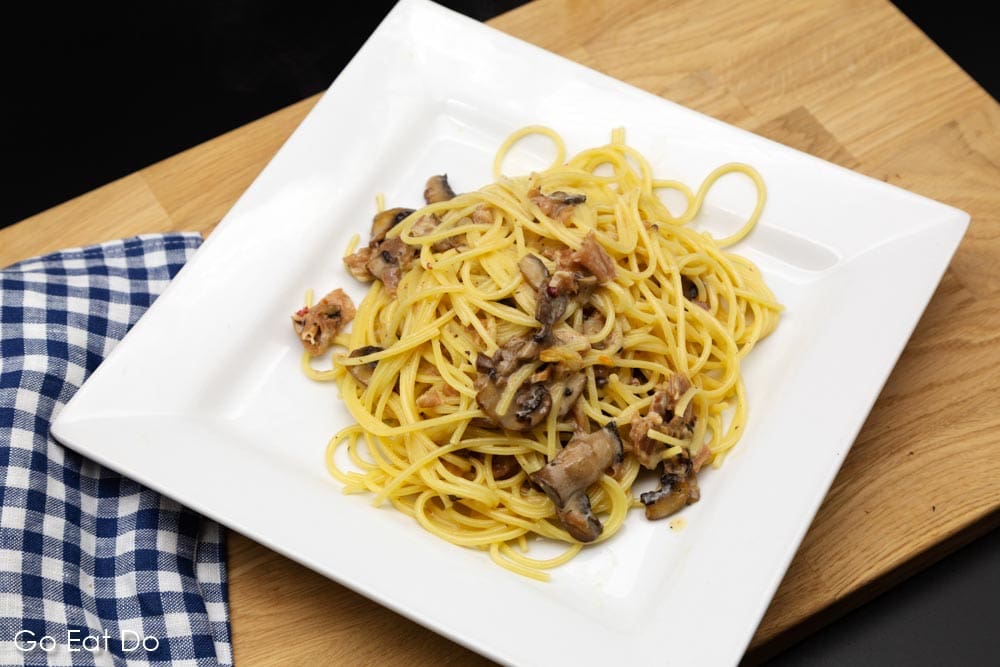 Spaghetti carbonara recipe with Parma Ham also features mushrooms, which do not feature in the traditional version