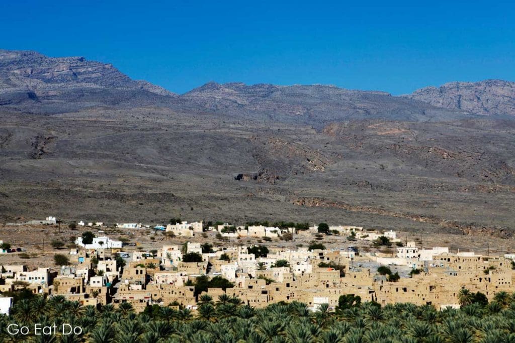 The earth-coloured houses of the Omani village of Al Hamra near Nizwa in Oman, is surrounded by lush plantations, thanks to the aflaj system of falaj irrigation canals.