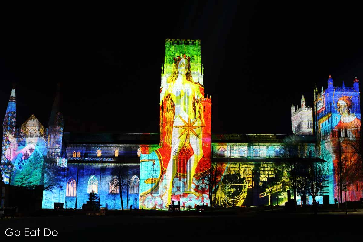 Historic imagery features in The World Machine, projected onto the facade of Durham Cathedral during the Lumiere Durham festival of light