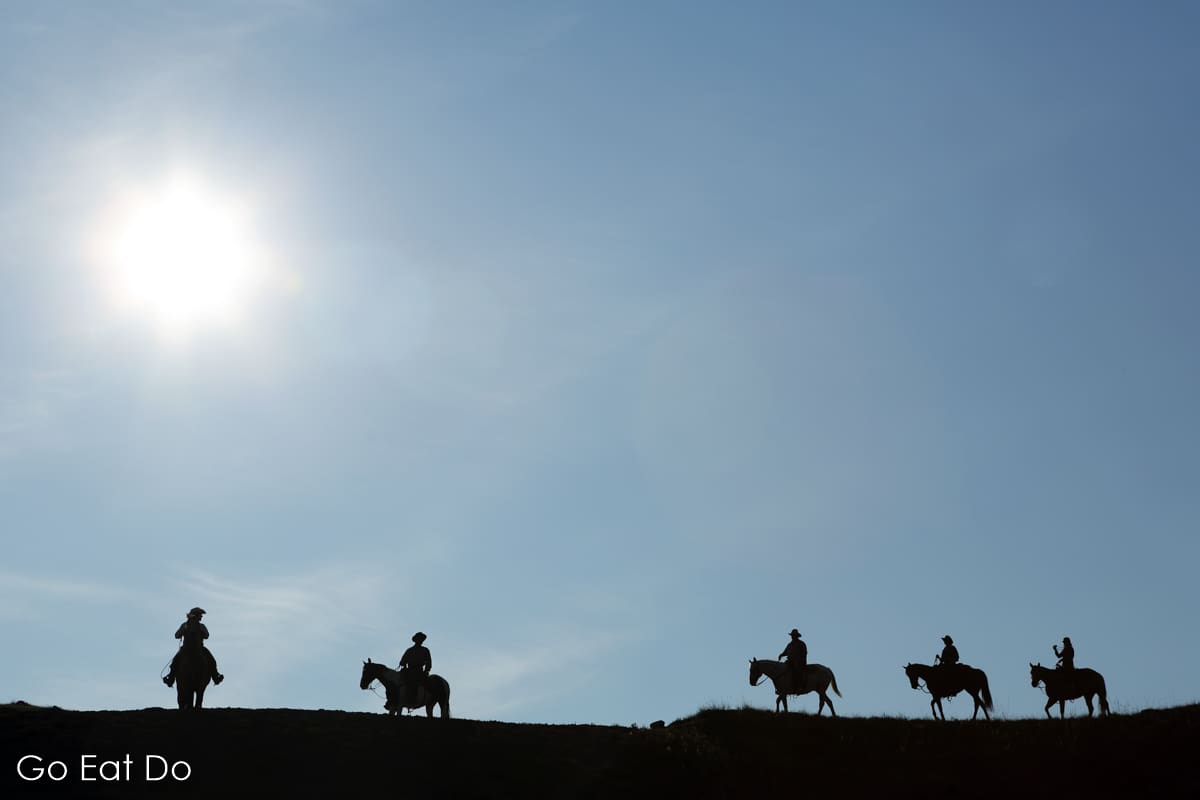 Horseback riding on a summer's day at La Reata Ranch near Kyle in Saskatchewan, Canada
