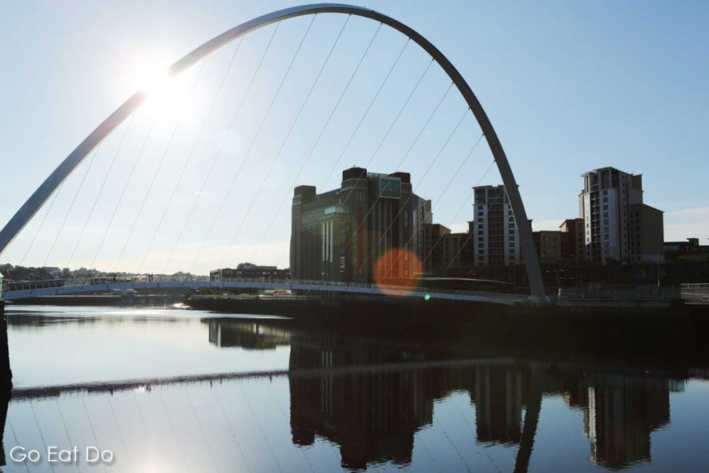 Sunshine over Gateshead Millennium Bridge and Baltic Centre for Contemporary Art seen from the Newcastle Quayside