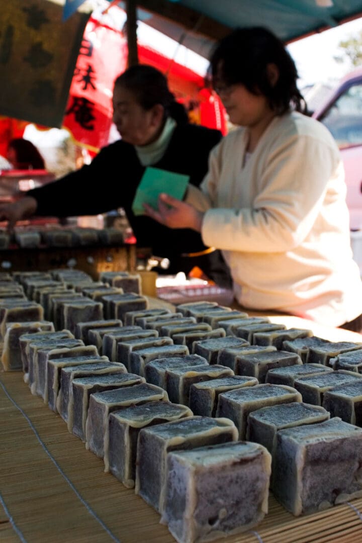 Traditional bean curd sweets on sale at a stall at the monthly Kobo-san market, one of the highlights of shopping in Kyoto.