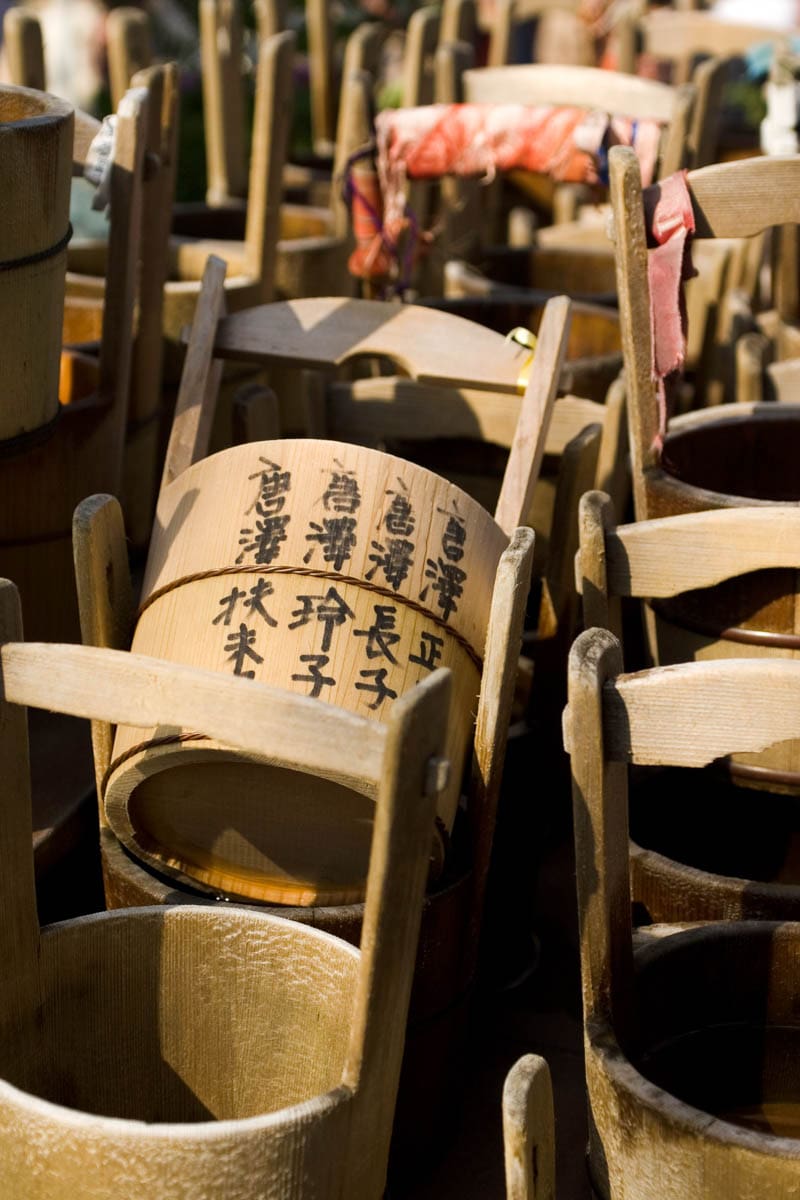 Wooden buckets offered for sale at the monthly Kobo-san market at the Toji Temple in Kyoto, Japan
