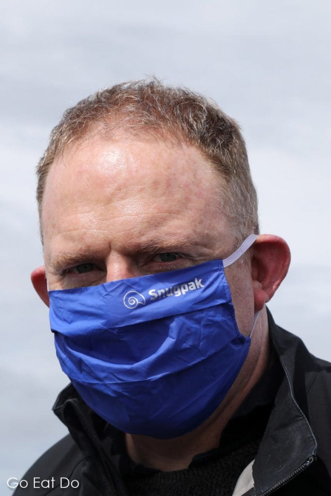Travel writer and blogger Stuart Forster wearing a Snugpak face covering
