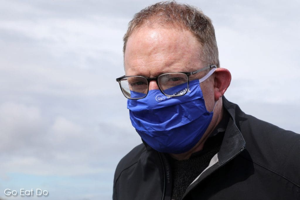 Travel blogger Stuart Forster wearing a Snugpak face cover