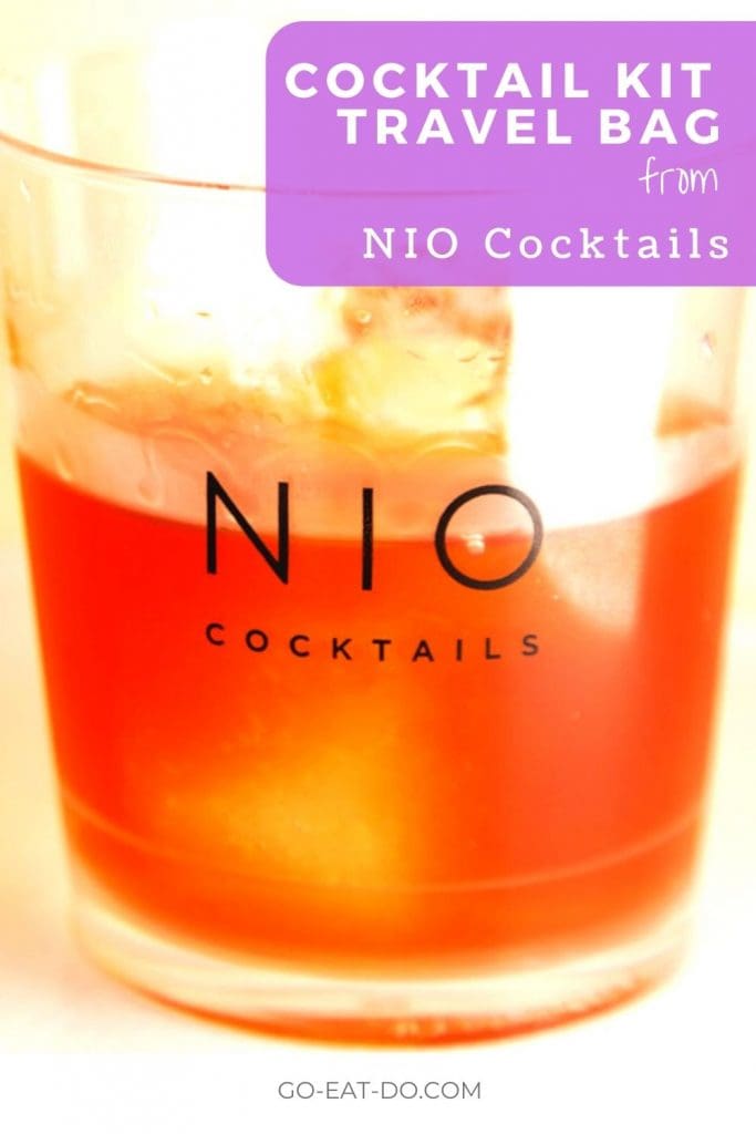 Pinterest pin for Go Eat Do's product overview of NIO Cocktails' cocktail kit travel bag