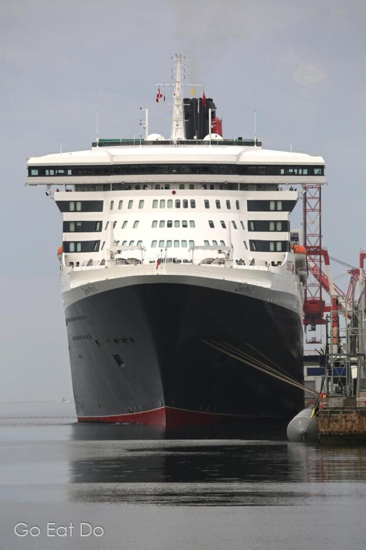 The Queen Mary 2 docked at Halifax, Nova Scotia. The city attracts many cruise ships.