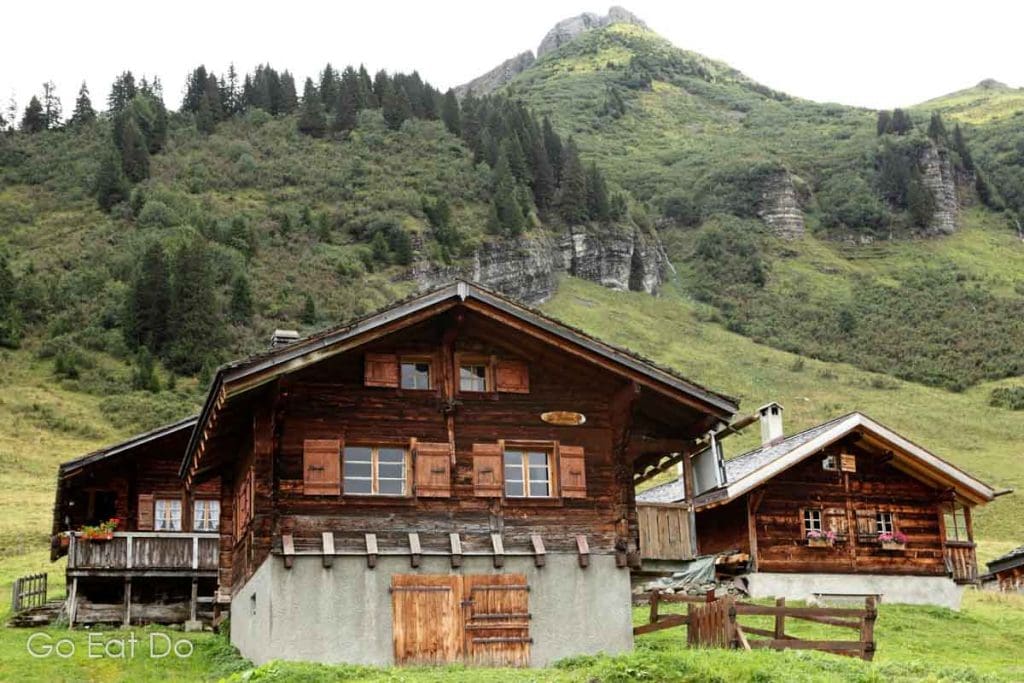 Wooden chalets in the village of Taveyanne, Switzerland. The chalets stand within a nature reserve.