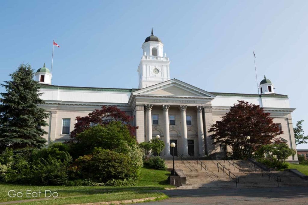 The facade of Acadia University in Wolfville, a city worth visiting when exploring Nova Scotia beyond Halifax