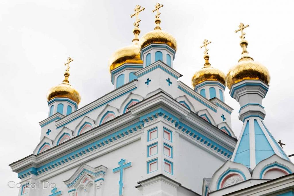 Golden domes shine on top the Saints Boris and Gleb Cathedral, the Russian Orthodox place of worship at Church Hill in Daugavpils, Latvia.