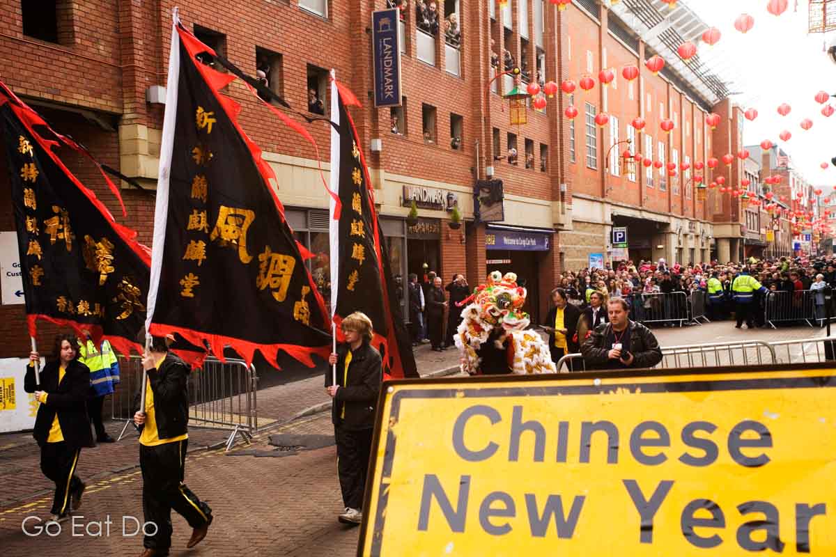 Banners are paraded along Stowell Street in Newcastle's Chinatown as part of Chinese New Year celebrations.