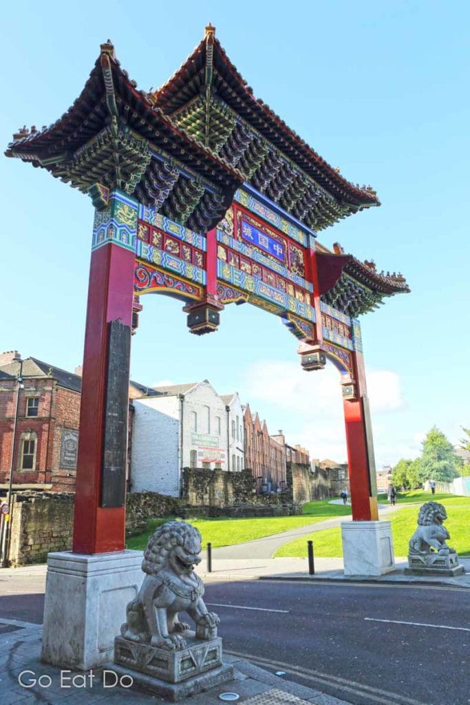 The colourful, inscribed gate at the entrance to Chinatown in , Newcastle upon Tyne, England.