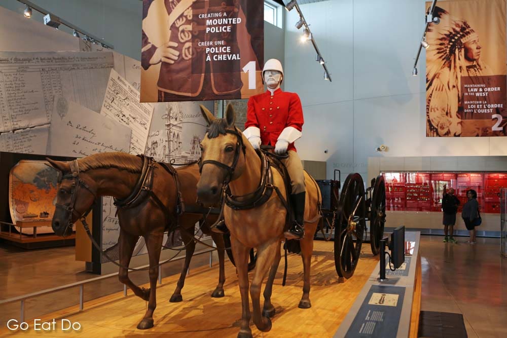 Display of a mounted police officer in the Royal Canadian Mounted Police Heritage Centre in Regina, Saskatchewan.