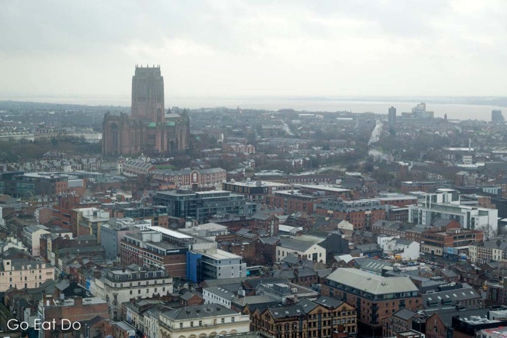 Liverpool Cathedral rises over the city in north-west England on a misty winter day.