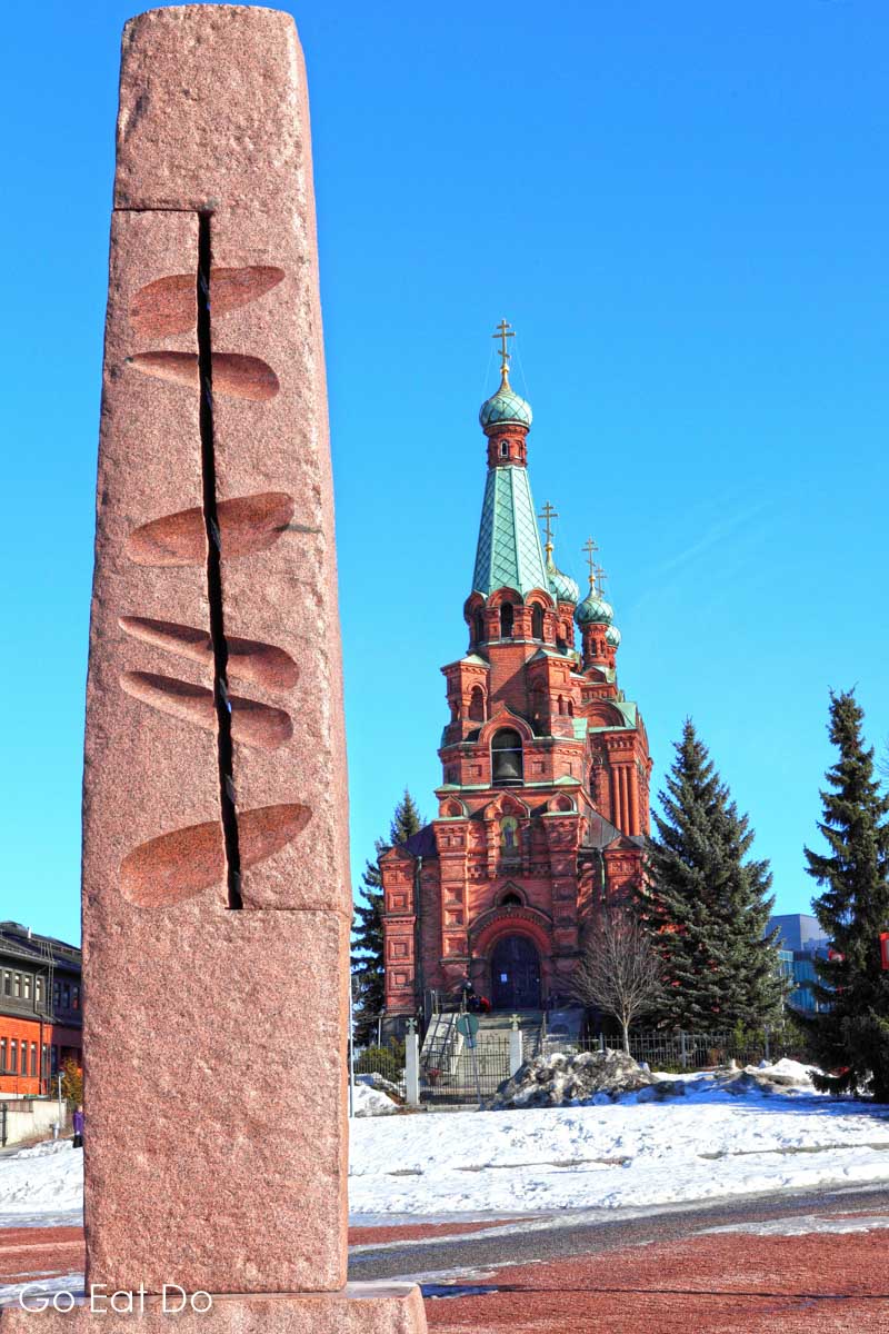 Obelisk by the Neo-Byzantine-style Orthodox Church, designed by T.U. Jazykov, seen on a sunny winter's day in Tampere.