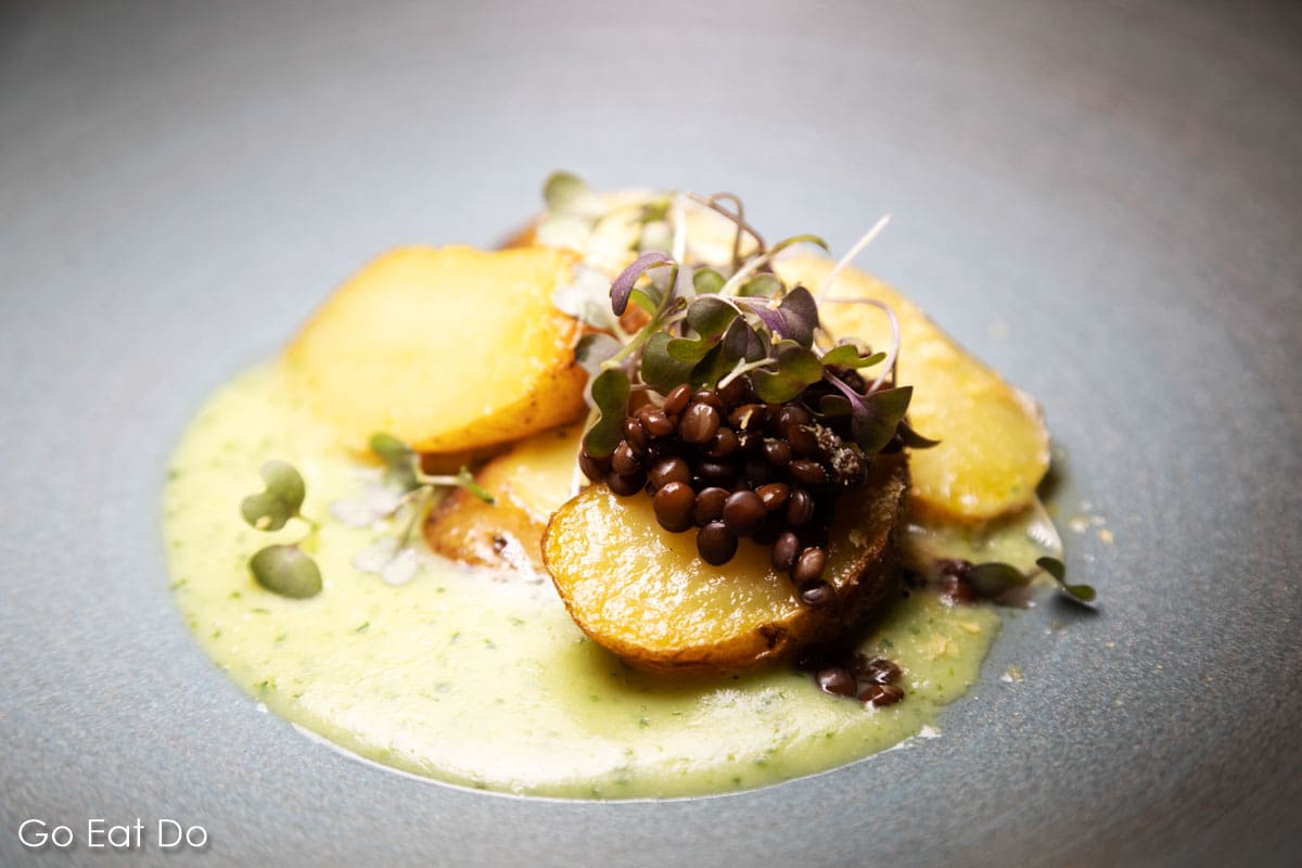 Apache potato, yeast, watercress and lentil served as a starter in The Black Bull's restaurant
