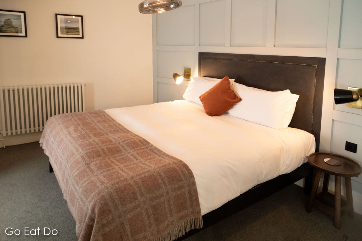 Bedroom with a neutral colour scheme at The Black Bull in Sedbergh.