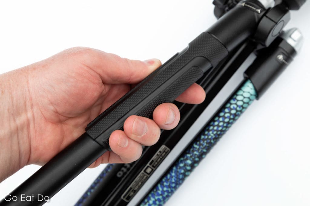 Grip on a Manfrotto Element MII tripod with a blue design.