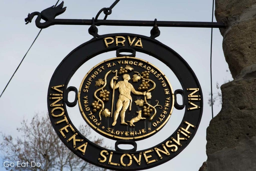 Sign for a Slovenian Vinothek in the historic Water Tower.