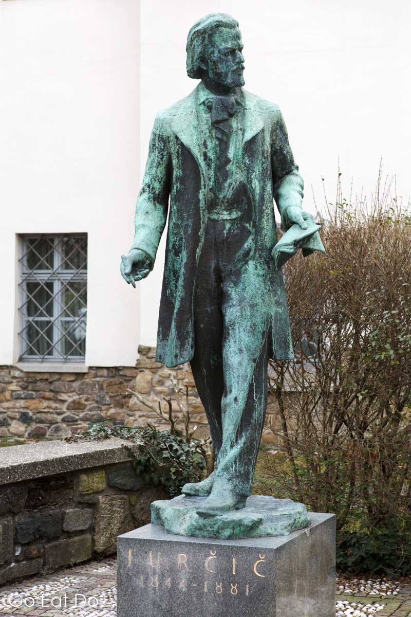 Statue of Josip Jurčič, a Slovene writer and journalist.