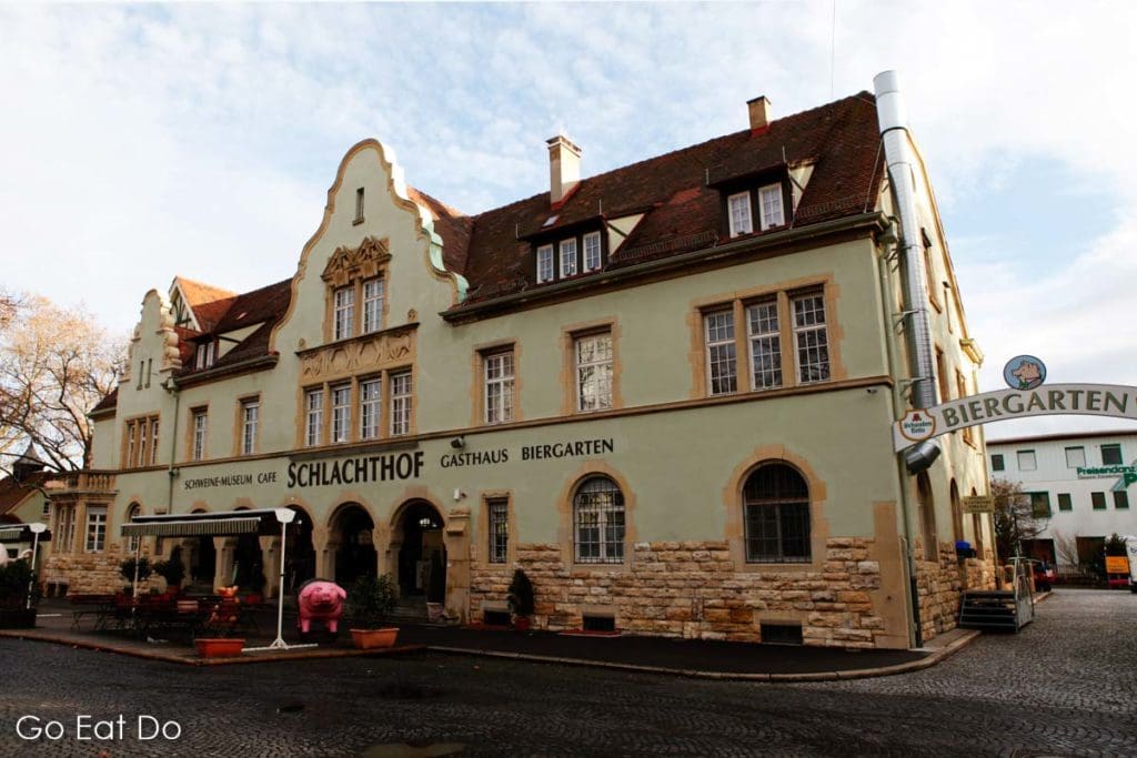 Exterior of the SchweineMuseum Stuttgart and Schlachthof restaurant and bar, which also has a beer garden.