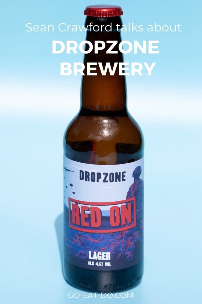Pinterest pin for Go Eat Do's interview with Sean Crawford about DropZone Brewery, the producer of Red On beer.