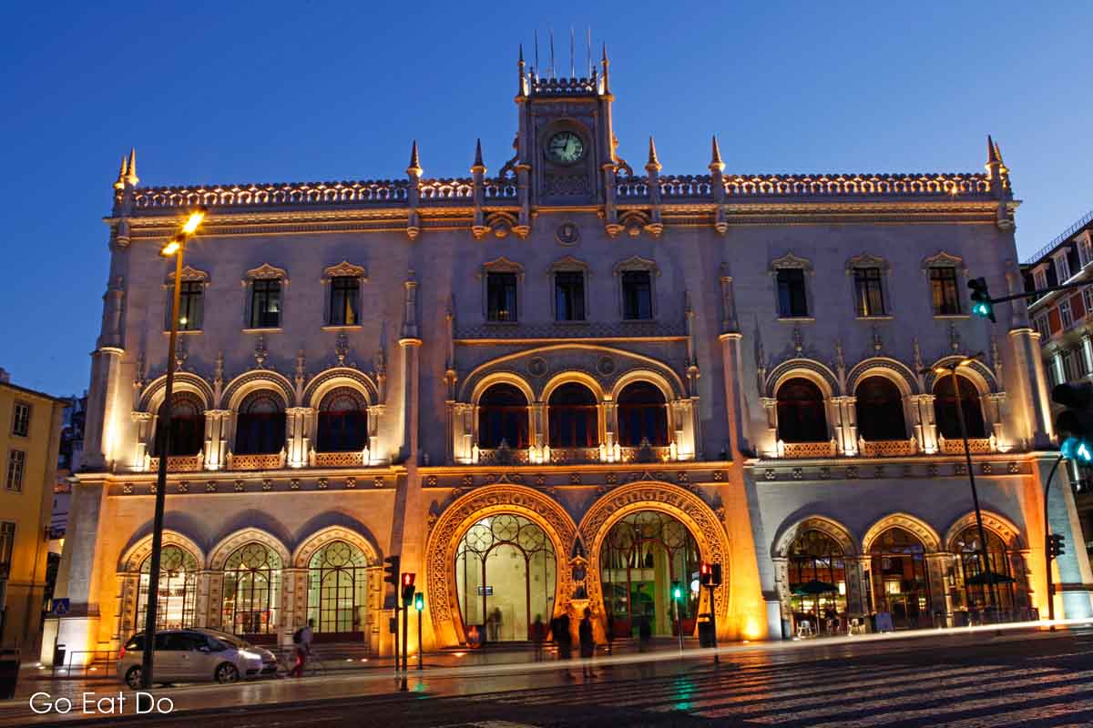 The illuminated facade of Lisbon's Rossio railway station, close to stores on the Avenida da Liberdade known for stocking leading international fashion in Portugal.
