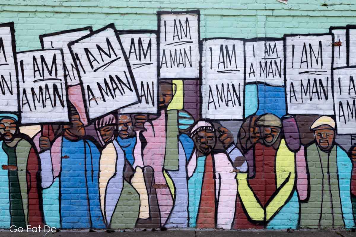 Street art in Memphis depicting an iconic moment of protest during the Civil Rights Movement.