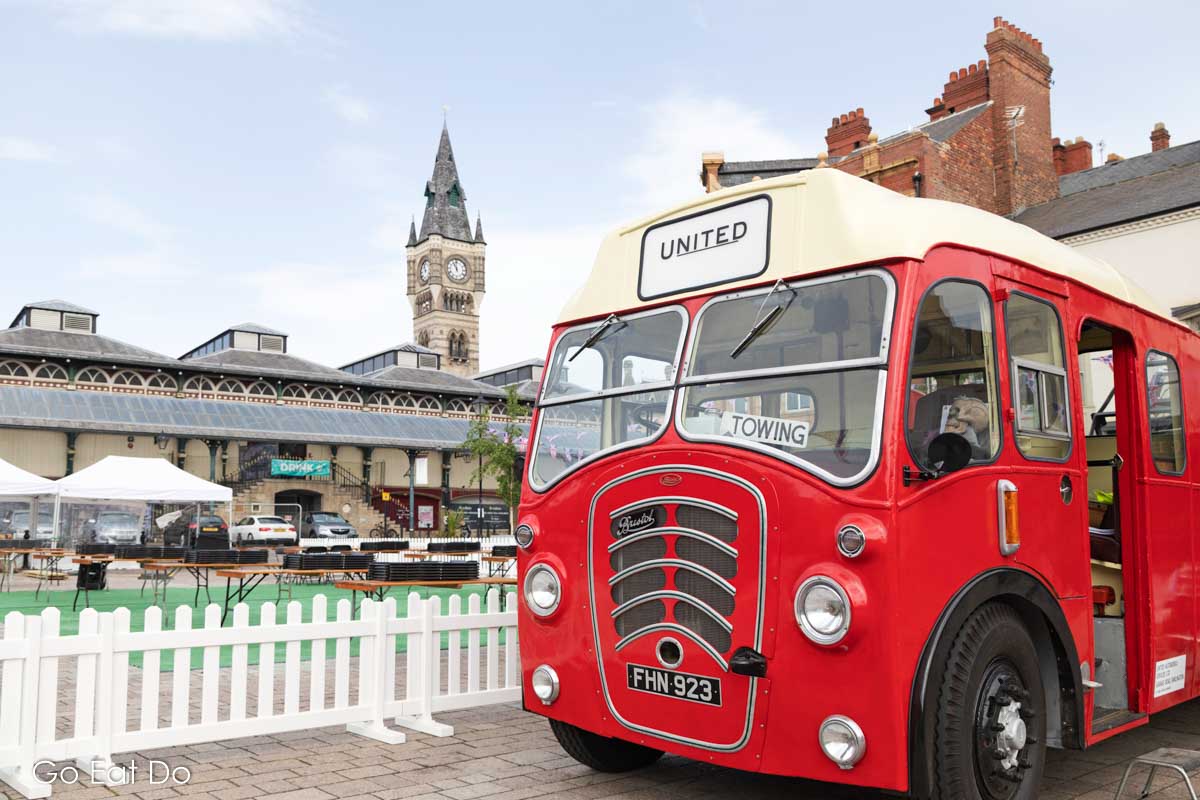 Vintage bus by Darlington Market clocktower