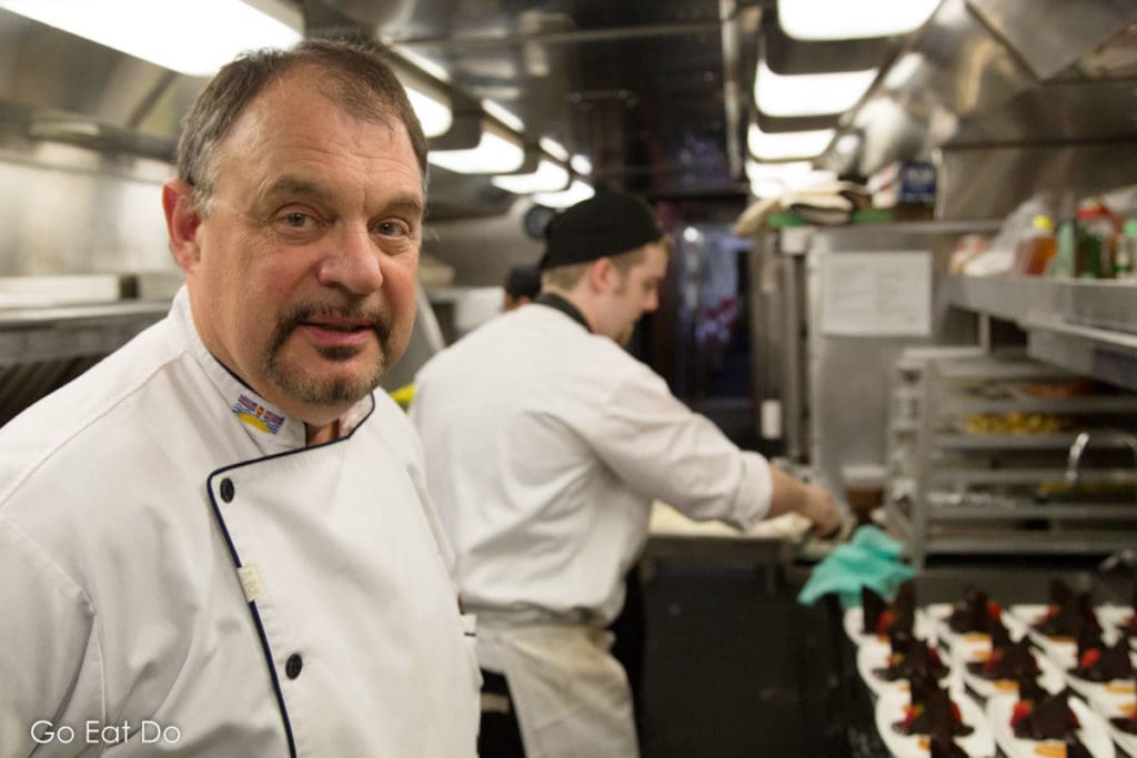 Executive Chef Jean Pierre Guerin in the Rocky Mountaineer's kitchen