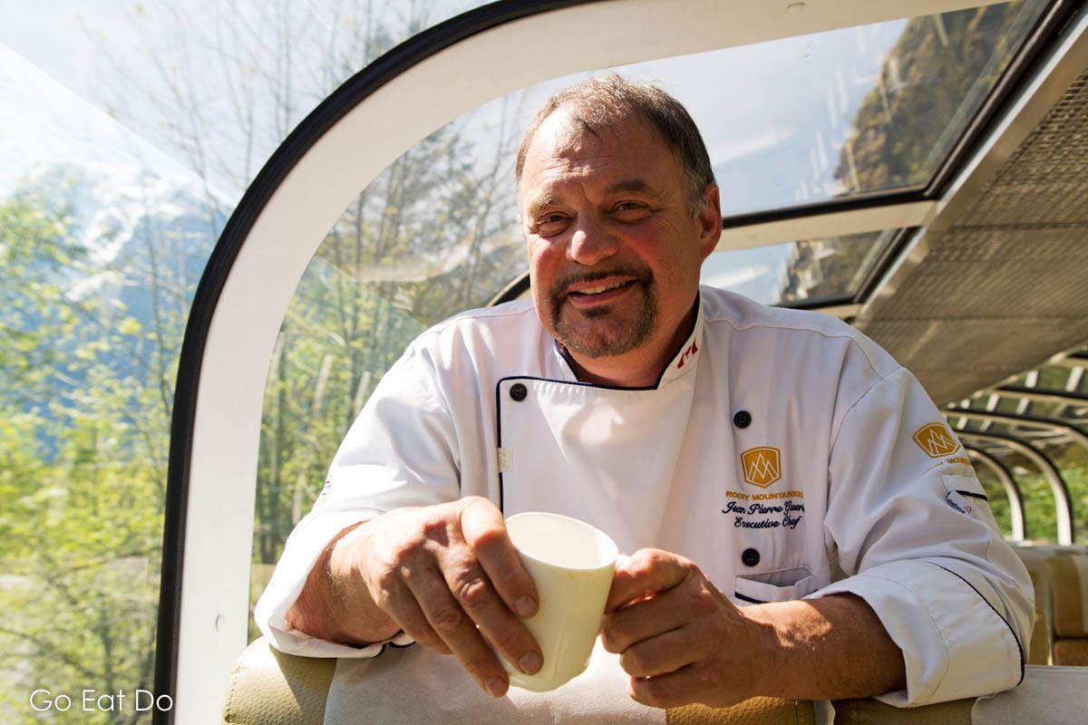 Executive Chef Jean Pierre Guerin riding the Rocky Mountaineer train in British Columbia.